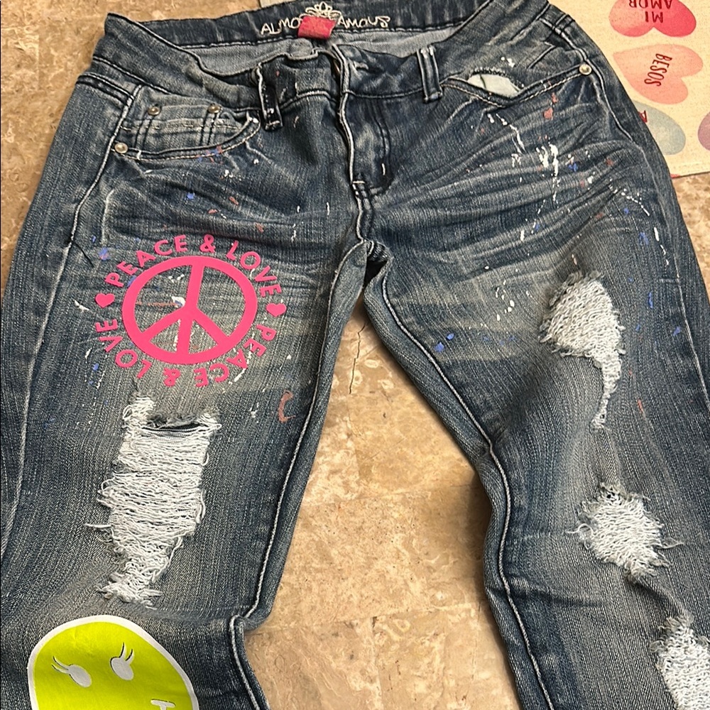 Almost Famous Blue Skinny Jeans with Distressing and Pink Design